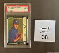Front view of 1999 Bowman Chrome T.J. Tucker Expos baseball card, graded PSA 9 MINT, in protective case with grading label visible.
