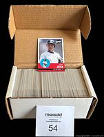 Box of 2001 Upper Deck baseball cards with one Derek Jeter card displayed on box