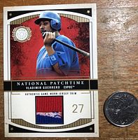 Full front view of 2003 Fleer Vladimir Guerrero Montreal Expos baseball card with colorful embedded fabric patch and player image.