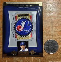 Front view of the 2003 Upper Deck Luis Ayala Rookie Patch card showing the Montreal Expos patch and player's photo with serial number 0663/7499.