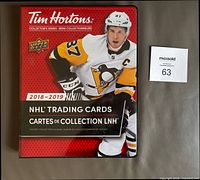 Full front cover of the Tim Hortons Upper Deck binder showing Sidney Crosby hockey card and branding.