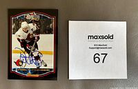 Front side of Daniel Alfredsson 2002-03 Bowman Young Stars hockey card showing player in Ottawa Senators uniform with autograph in blue Sharpie.