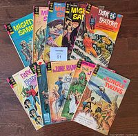 Lot of 10 Gold Key comic books displayed fanned out on a wood floor: 4 Mighty Samson, 2 Dark Shadows, The Lone Ranger, Grimm’s Ghost Stories, and 2 Tono and Kono the Jungle Twins