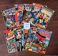 Full lot of 10 Marvel comic books laid out showing all covers.