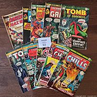 Photo showing all 10 Marvel comic books with visible front covers including Daredevil The Black Widow and Tomb of Darkness