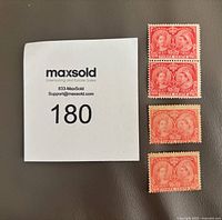 Front view of four 1897 Canada 3¢ Jubilee stamps (one joined pair plus two singles) next to lot tag
