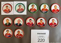 Front view of all 12 Montreal Canadiens coins showing portraits and rim colours