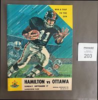 Front cover showing artwork, title, date and venue