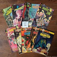 All ten comics fanned out showing covers