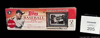 Front of sealed 2013 Topps Baseball Complete Set box showing Babe Ruth image, $69.99 price, exclusive patch card note
