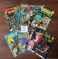 Group shot of all ten comics fanned out