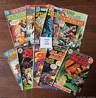 All 10 comics fanned out showing front covers