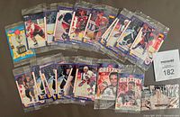 All 20 sealed cards spread out showing fronts