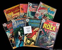 Group shot of eight bagged comic books