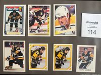 Fronts of all seven Mario Lemieux cards and stickers