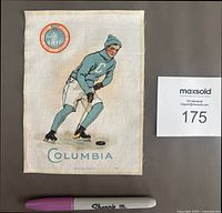 Front of printed Columbia University tobacco silk with Sharpie for scale