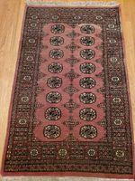 Full view of the vintage hand knotted runner rug, showing overall design and color.