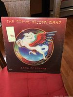 Front cover of the vinyl album showing the Pegasus illustration and title 'The Steve Miller Band Book of Dreams'