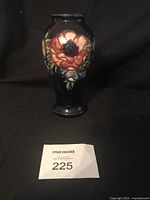 Front view of vase showing cobalt blue ground and red anemone bloom