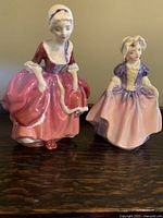 Both figurines together showing size and appearance