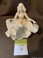 Frontal view of the Royal Doulton 'Sweet Seventeen' figurine showing the detailed dress and figure