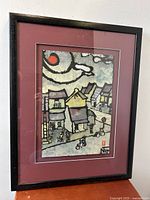 Framed Japanese surrealist oil painting with signature and seal visible.