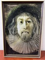 Full frontal view of the framed oil and mixed media painting on metal depicting a bearded noble man with ruffled collar and dark hat, signed by artist Paul Szentkuthy.