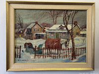 Frontal close-up view of the signed oil painting showing winter horse-and-sleigh scene and snowy houses in detail.