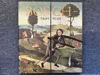 Front cover of the art book featuring a classic Bosch painting with the title 'BOSCH - TRIPTYCHS' split over two panels.