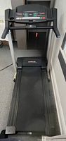 Front view of ProForm treadmill showing running belt and frame.