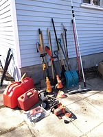 Wide view of all items lined against siding