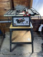 Full view of the King 10" table saw on stand showing overall condition and structure.
