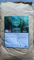 10 kg bag of Gaia Green Kelp Meal 1-0-2 showing label with ocean kelp design and organic certification