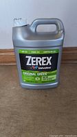 Front view of 1 gallon Valvoline Zerex antifreeze container labeled for GM, Ford, and Chrysler vehicles