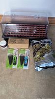Full lot showing plastic dome, Grodan tray, pruners, rooting gel and plugs bag