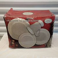 Box front showing Waverly Almond 16-piece dinner set in fine porcelain, factory packaged but box is damaged.