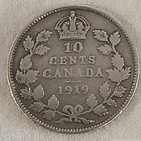 Reverse of 1919 Canadian 10 cent silver coin showing crown, denomination, year, and maple leaf wreath.