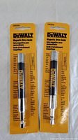 Photo of two DeWalt Magnetic Drive Guides in original packaging front view showing product and branding details.