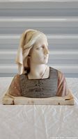 Front view of the Joan of Arc bust showing facial details and bodice