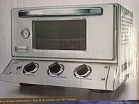 Front view of the Bravetti Pro convection oven showing control knobs and viewing window.