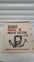 Original box for Goko Dual 8 Movie Editor L-120 showing model name and film compatibility.