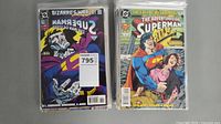 Two Superman comic books side by side, Bizarro themed cover and The Adventures of Superman with Superman holding a woman