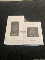 Korres Black Pine skincare night products in original packaging, showing front labels with product size and purpose.
