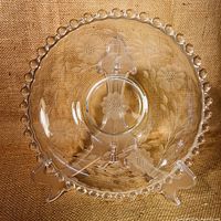 Top view of the Cornflower etched shallow bowl showing beaded edge and floral etched pattern on clear glass.