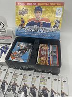 Box of 2024-25 Upper Deck Hockey Series One with hockey card packs and Tim Hortons packs