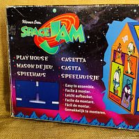 Front of the original box showing Warner Bros Space Jam branding and playhouse illustration
