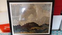 Full view of framed print 'Sunlit Hill' with reflections visible