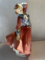 Front view of the Royal Doulton 'Judith' figurine showing the detailed coloration and pose.