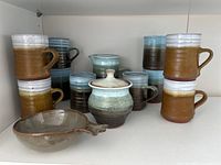 Overall lot: mugs, pitcher, sugar bowl, spouted bowl