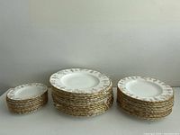 Full set arranged in three stacks: dinner, luncheon and bread & butter plates